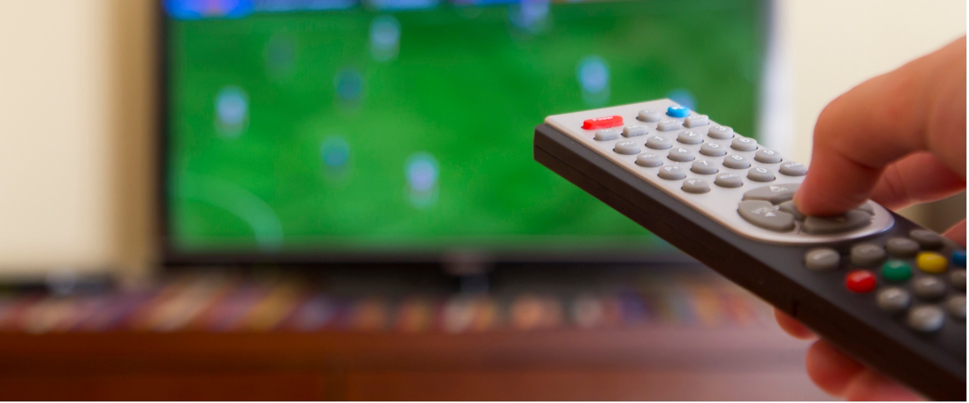 television remote control in human hands