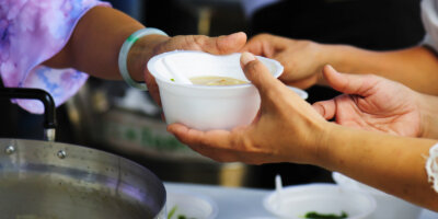 Passing a bowl of soup