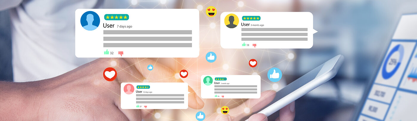 Header image showing user reviews being read on a mobile phone in the foreground along with a laptop showing graphs and charts in the background, all part of the CX tech stack.