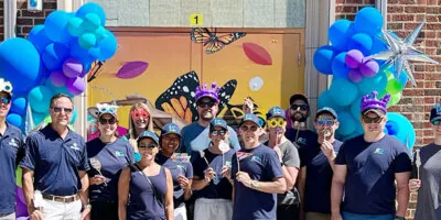 RevGen volunteers pose for a photo after helping out at the Valverde Elementary 100th Anniversary party.